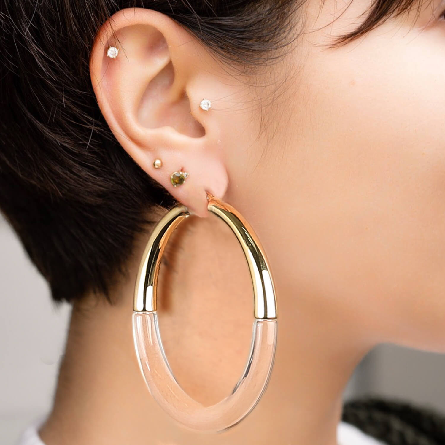 XL Chunky graduated hoop earrings in clear and gold