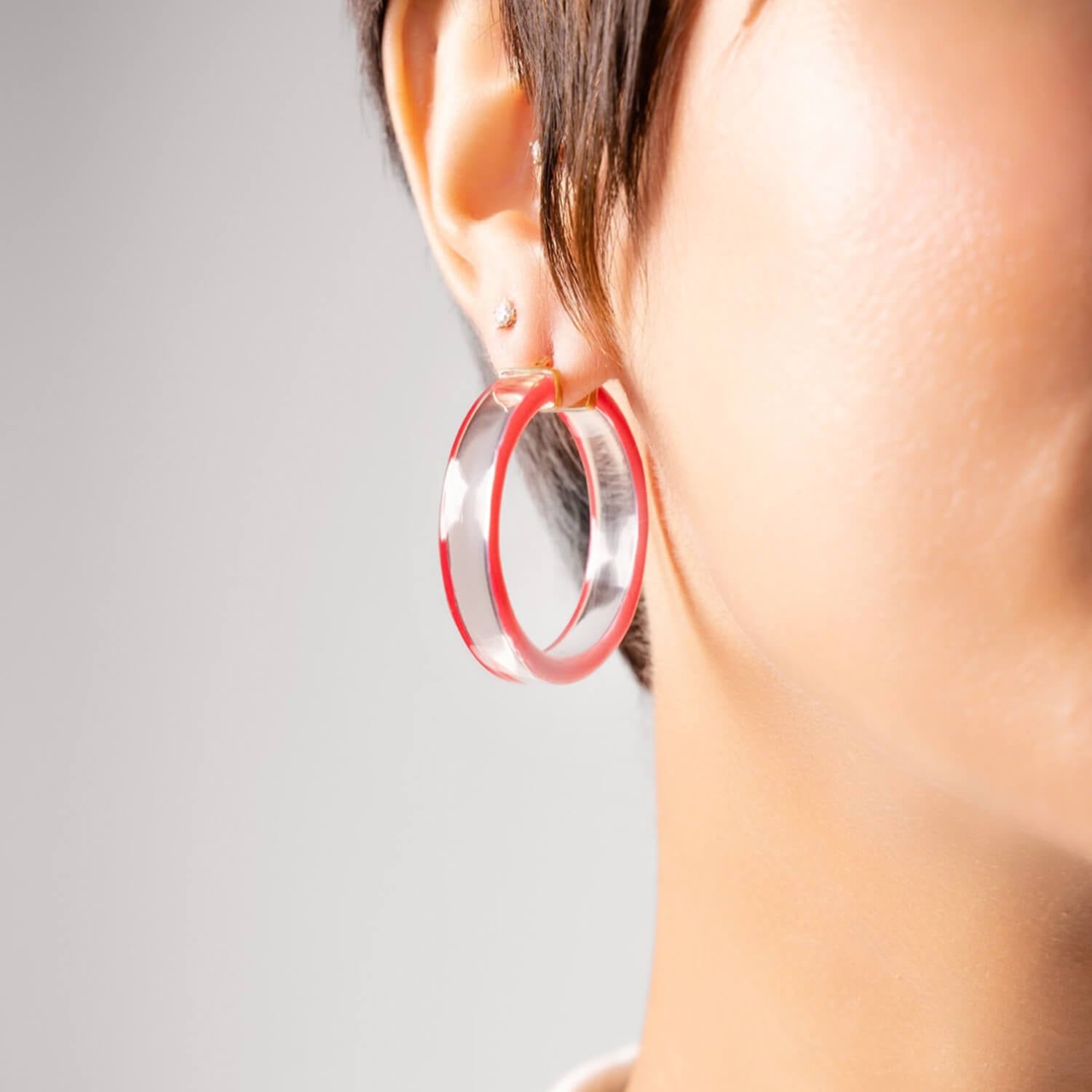 INSIDE OUT PINK AND CLEAR LUCITE HOOP EARRINGS